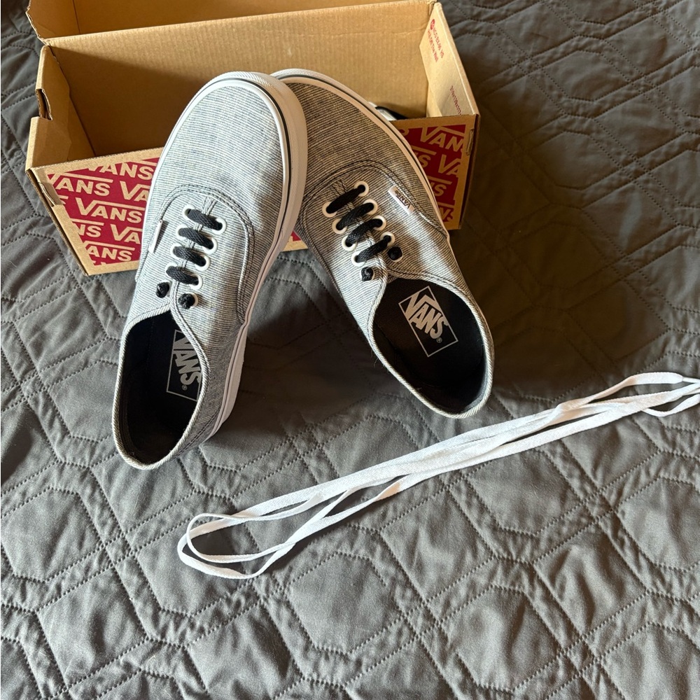 Vans Women’s Black and White Canvas Sneakers